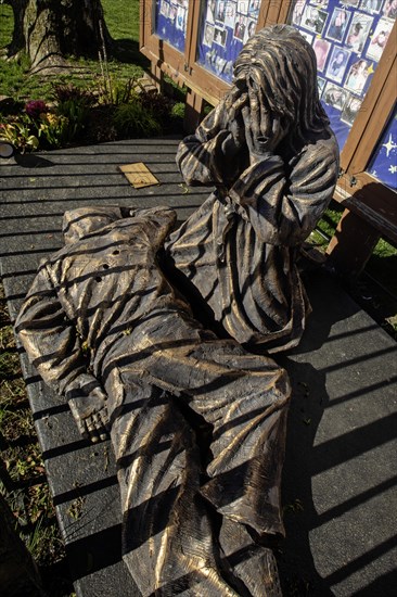 Chicago, Illinois, A bronze sculpture called Thou Shalt Not Kill shows Jesus Christ weeping over a