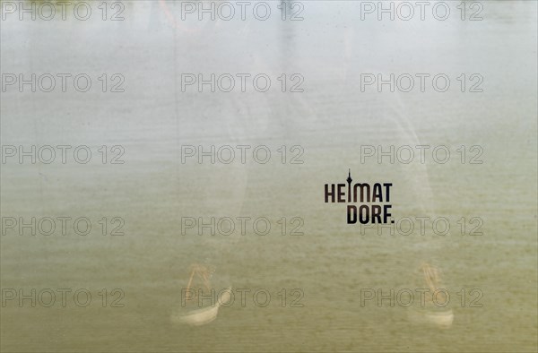 Heimatdorf, inscription on glass balustrade on the harbour bridge Living Bridge m Medienhafen