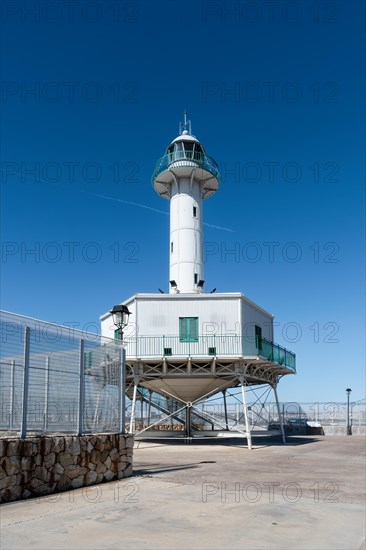 Far de la Banva lighthouse on the Moll de Llevant promenade, a 4.5 km long promenade for joggers,