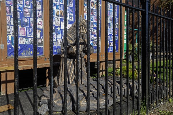 Chicago, Illinois, A bronze sculpture called Thou Shalt Not Kill shows Jesus Christ weeping over a
