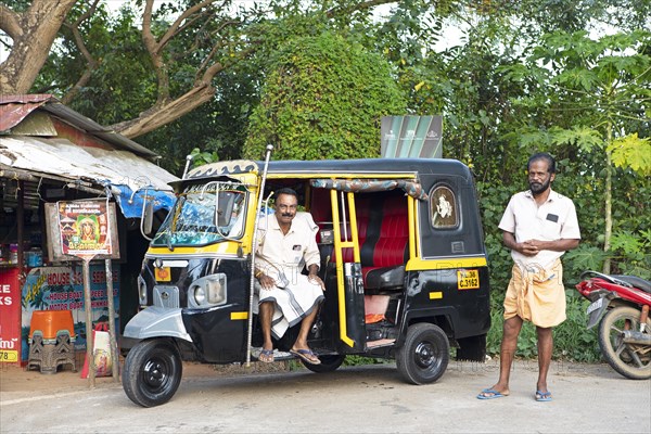 Tuk Tuk driver in Kavanattinkara, Backwaters, Kerala, India, Asia