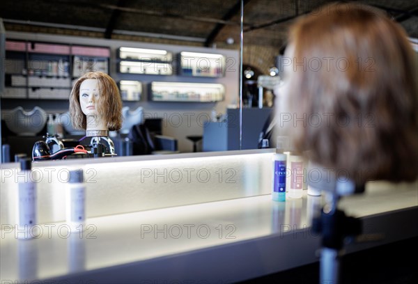 A training head for hairdressers, taken in the hairdressing salon Coiffeur Sivan in Berlin,