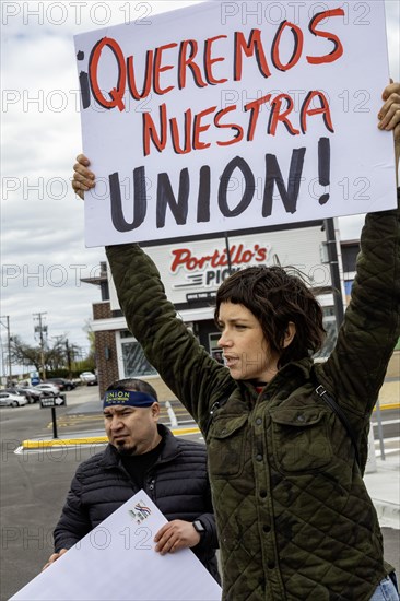 Rosemont, Illinois, Hundreds of workers and supporters picketed a Portillo's restaurant, demanding