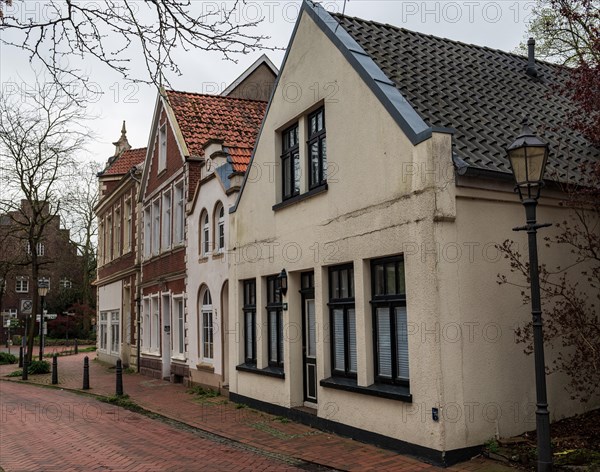 Row of historic houses on Norderstrasse in the small town of Weener, district of Leer, Rheiderland,