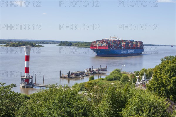 Cosco container ship and lighthouse on the Elbe, Blankenese district, Hamburg, Germany, Europe