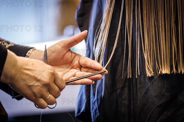 Close-up of a haircut, taken at the Coiffeur Sivan hairdressing salon in Berlin, 22/04/2024