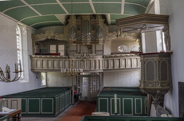 Protestant Reformed Church from 1401, interior with pews, pulpit and organ, Greetsiel, Krummhoern,