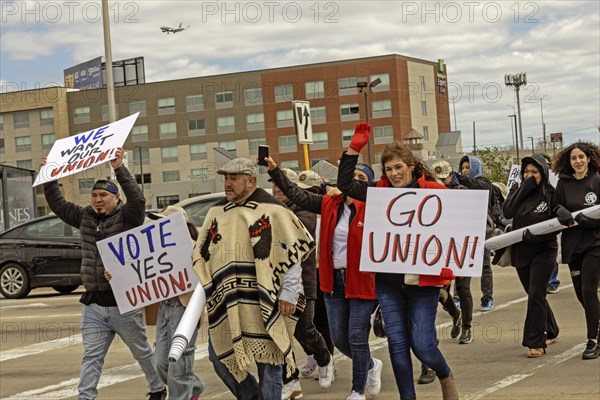 Rosemont, Illinois, Hundreds of workers and supporters picketed a Portillo's restaurant, demanding
