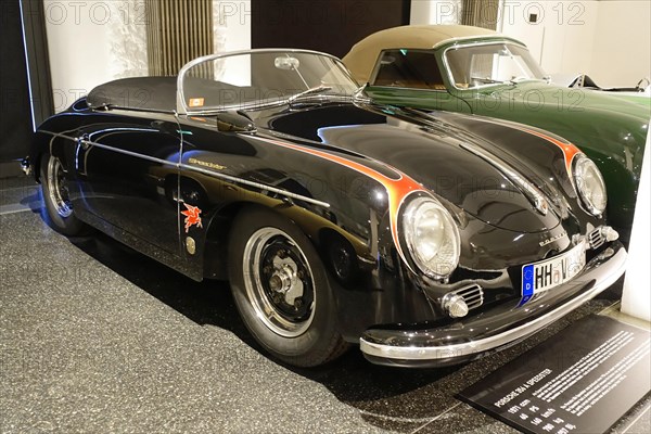 Porsche 356 A SPEEDSTER, Black vintage Porsche sports car presented in an exhibition, AUTOMUSEUM
