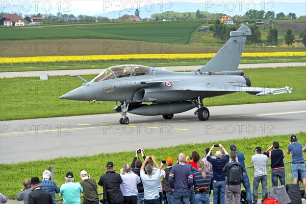 Tree warblers observe a Dassault Rafale B twin-seater multi-role combat aircraft of the French Air