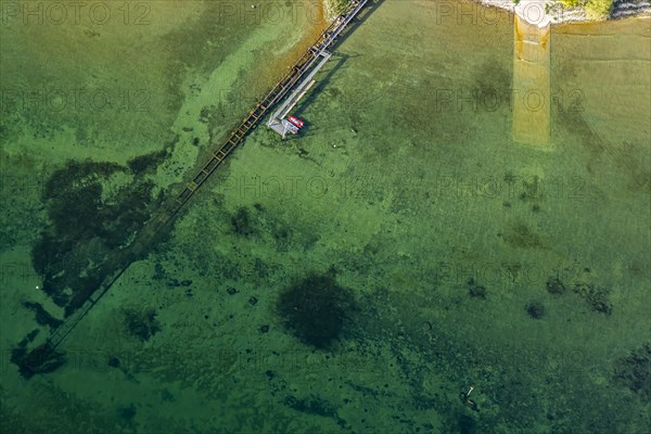Flight in a zeppelin along the shore of Lake Constance, aerial view, shore area with turquoise