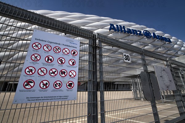 Exterior view Allianz Arena, board, sign, prohibited objects, fence, logo, Munich, Bavaria,