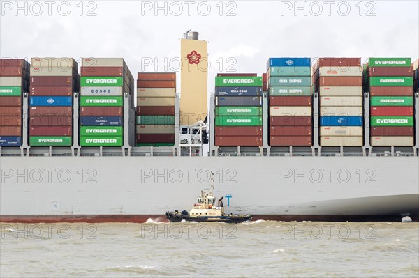OOCL Zeebrugge container ship leaving departing from Port of Felixstowe, Suffolk, England, UK