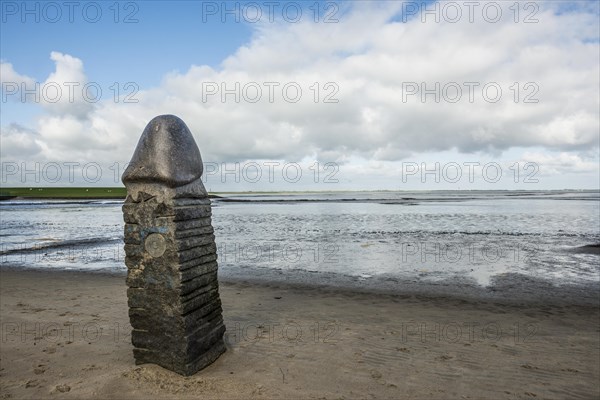 Stone sculpture on the beach and Wadden Sea, penis, artist Eckart Grenzer, Dangast, Jade Bay, North