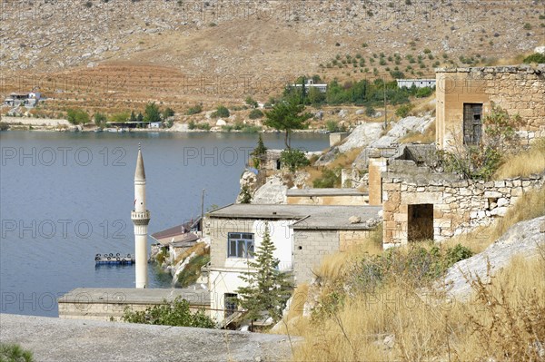 Sunken houses and mosque of Eski Savasan due to the construction of the Birecik dam on the