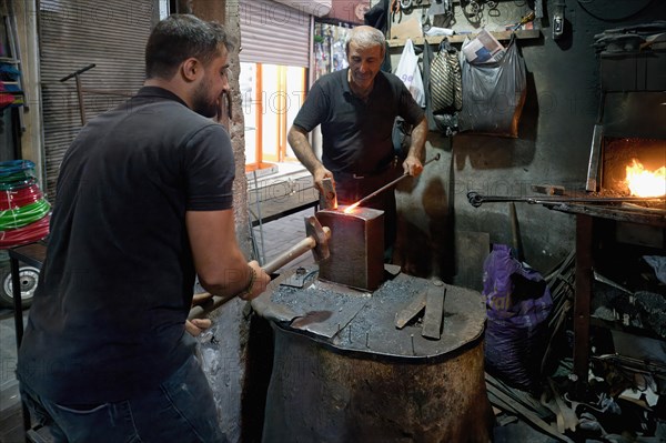 Working blacksmith, Sanliurfa bazaar, Turkey, Asia