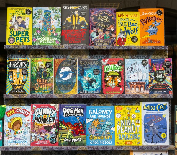 Book display of children's books in shop window of Waterstones bookshop, Ipswich, Suffolk, England,