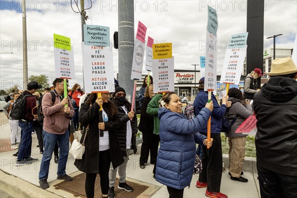 Rosemont, Illinois, Hundreds of workers and supporters picketed a Portillo's restaurant, demanding