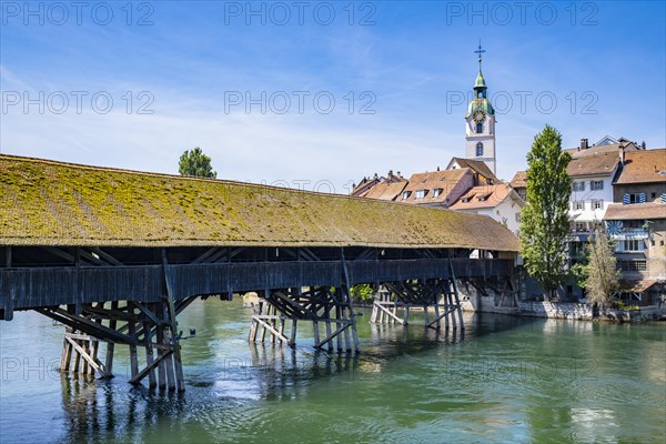 View of an old wooden bridge with an old town in the background, Olten, Solothurn, Switzerland,