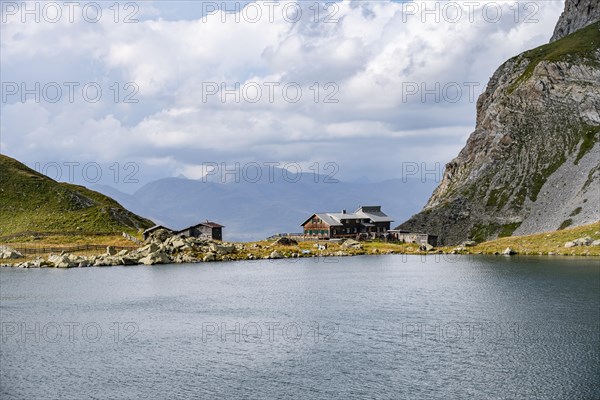 Obstanserseehuette mountain hut on the Obstansersee mountain lake, Carnic main ridge, Carnic High