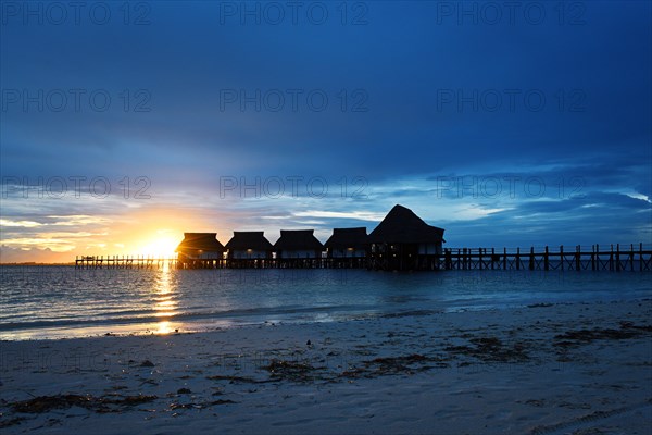 Sunset with clouds on the Kae beach, Zanzibar, Tanzania, Africa