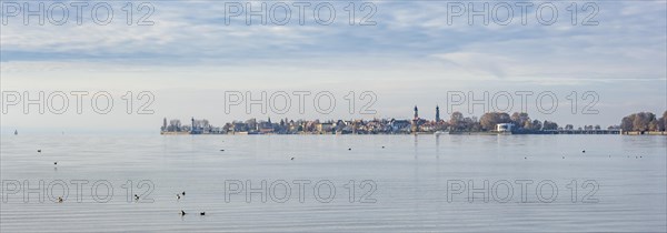 View over the lake to the village of Lindau Island with church towers, Lindau, Lake Constance,