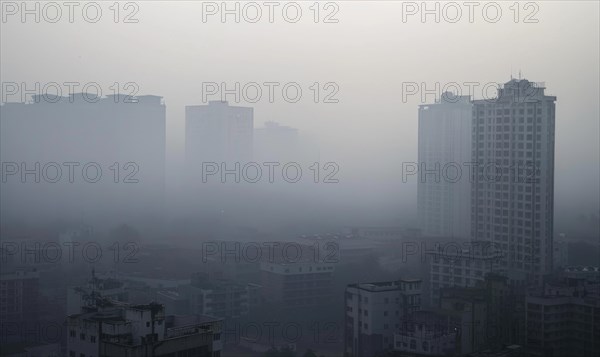 Urban landscape shrouded in smog with tall buildings barely visible AI generated