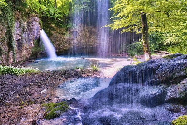 Waterfall in the forest with a small pond, Canton Basel-Landschaft, Switzerland, Europe