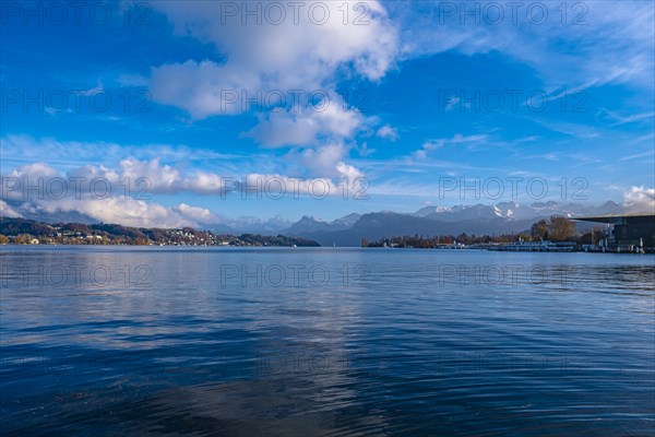 Lake Lucerne with mountain landscape in the background and blue sky with clouds, Lucerne,