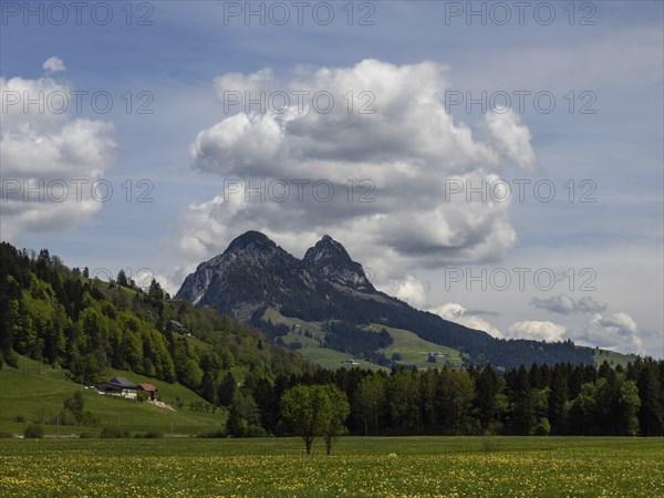 Cloudy mood over a mountain peak, near Bad Mitterndorf, Styria, Austria, Europe