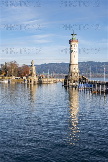 Harbour entrance of Lindau harbour, pier with New Lindau Lighthouse and Bavarian Lion, in the