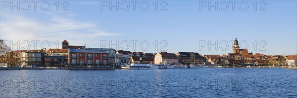Town panorama with town harbour on Lake Mueritz, St. Georgen Church and St. Marien Church, Waren,