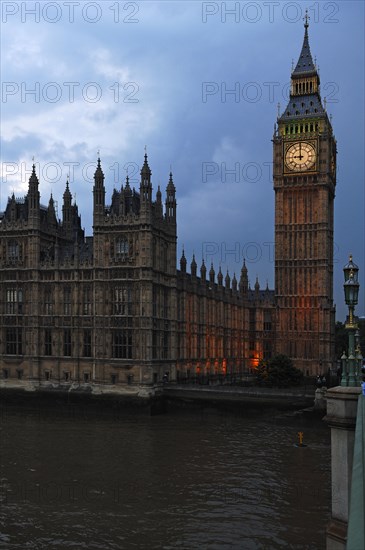 Palace of Westminster and Big Ben seen at dusk from Westminster Bridge, London, England, United