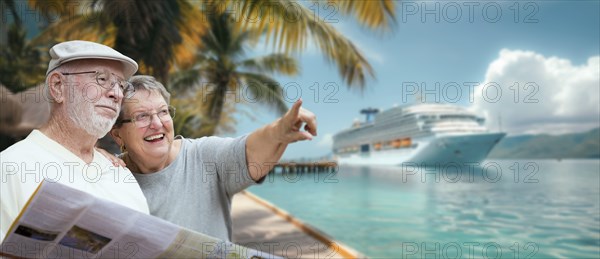 Senior adult couple enjoying the view from the dock with passenger cruise ship in the background