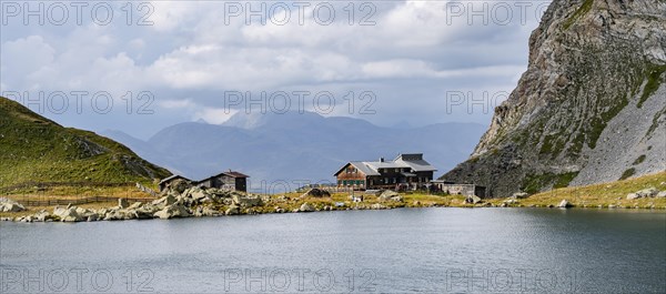 Obstanserseehuette mountain hut on the Obstansersee mountain lake, Carnic main ridge, Carnic High