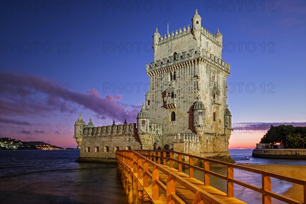 Belem Tower or Tower of St Vincent famous tourist landmark of Lisboa and tourism attraction on bank