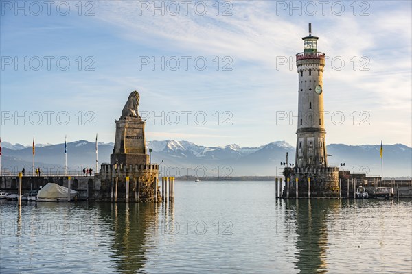 Harbour entrance of Lindau harbour, pier with New Lindau Lighthouse and Bavarian Lion, in the