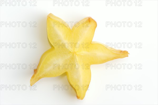 Star fruit or carambola (Averrhoa carambola), sliced fruit on a white background