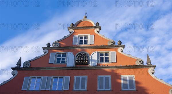 Detail of the red facade of the New Town Hall with carillon, Lindau Island, Lake Constance,