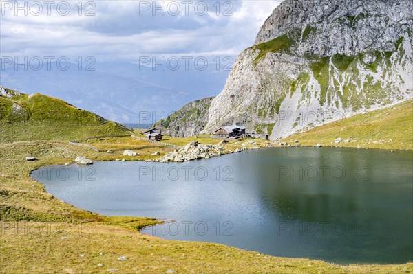 Obstanserseehuette mountain hut on the Obstansersee mountain lake, Carnic main ridge, Carnic High