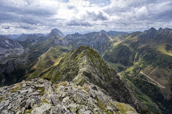 View of mountain landscape, mountain peak on the Carnic main ridge, view from the Raudenspitze or
