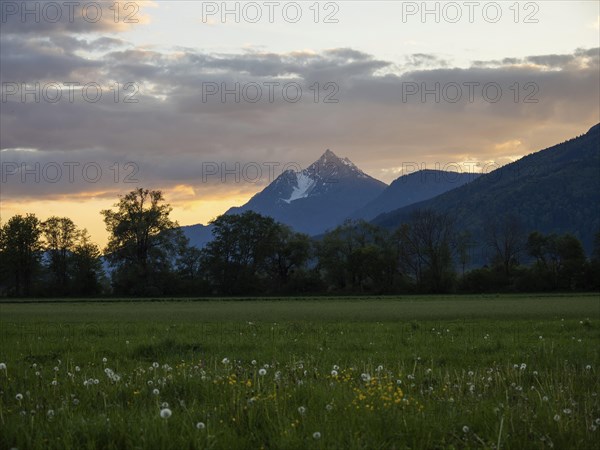 Evening clouds over mountain peak, Kammspitze, near Irdning, Ennstal, Styria, Austria, Europe