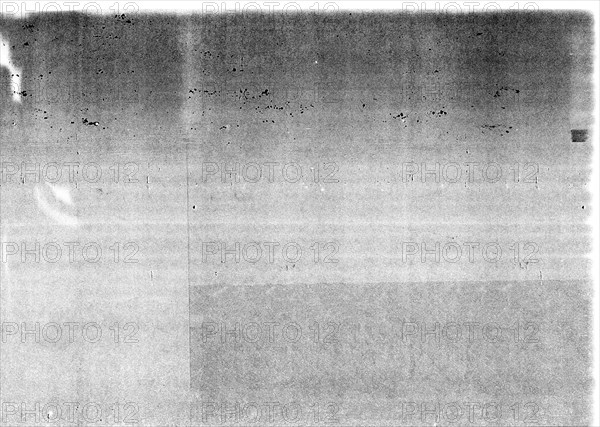 Dark grunge dirty photocopy grey paper texture useful as a background