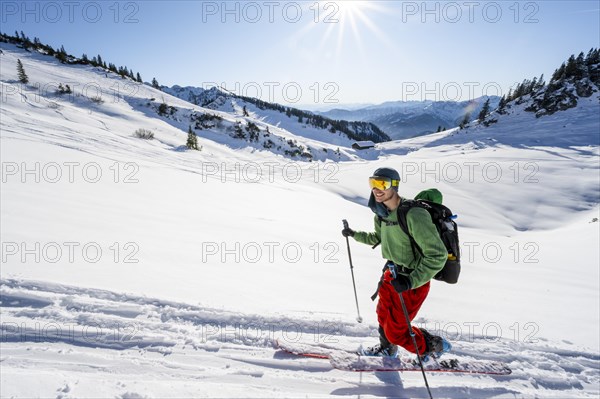 Ski tourers climbing the Aiplspitz, Mangfall mountains, Bavarian Prealps, Bavaria, Tyrol