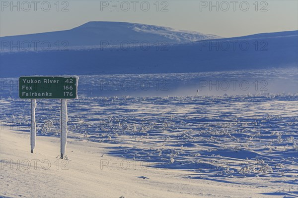 Road sign on the Dalton Highway in winter, Alaska, USA, North America