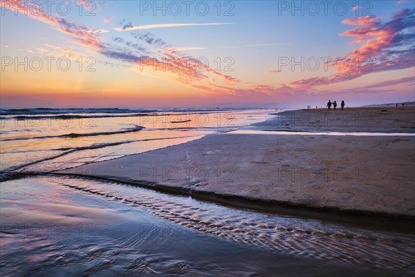 Atlantic ocean after sunset with surging waves at Fonte da Telha beach, Costa da Caparica,