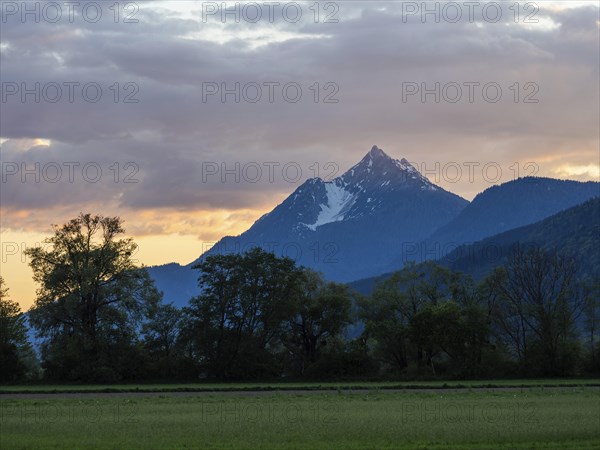 Evening clouds over mountain peak, Kammspitze, near Irdning, Ennstal, Styria, Austria, Europe