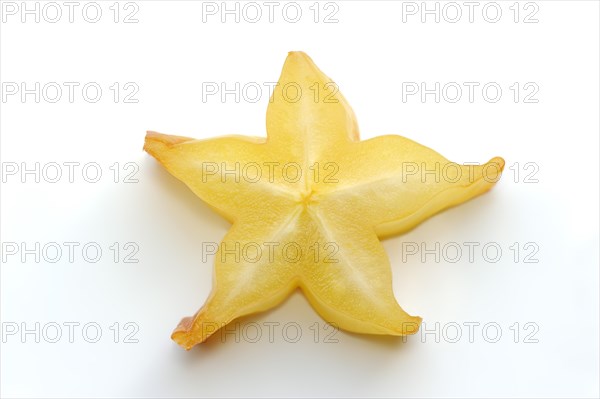 Star fruit or carambola (Averrhoa carambola), sliced fruit on a white background