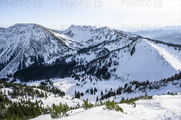 View from the summit of the Aiplspitz in winter, snow-covered mountain landscape with the Rotwand