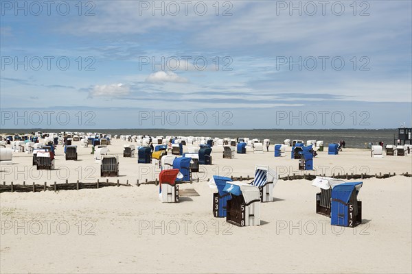 Beach chairs on the sandy beach, Harlesiel, Carolinensiel, East Frisia, Lower Saxony, Germany,